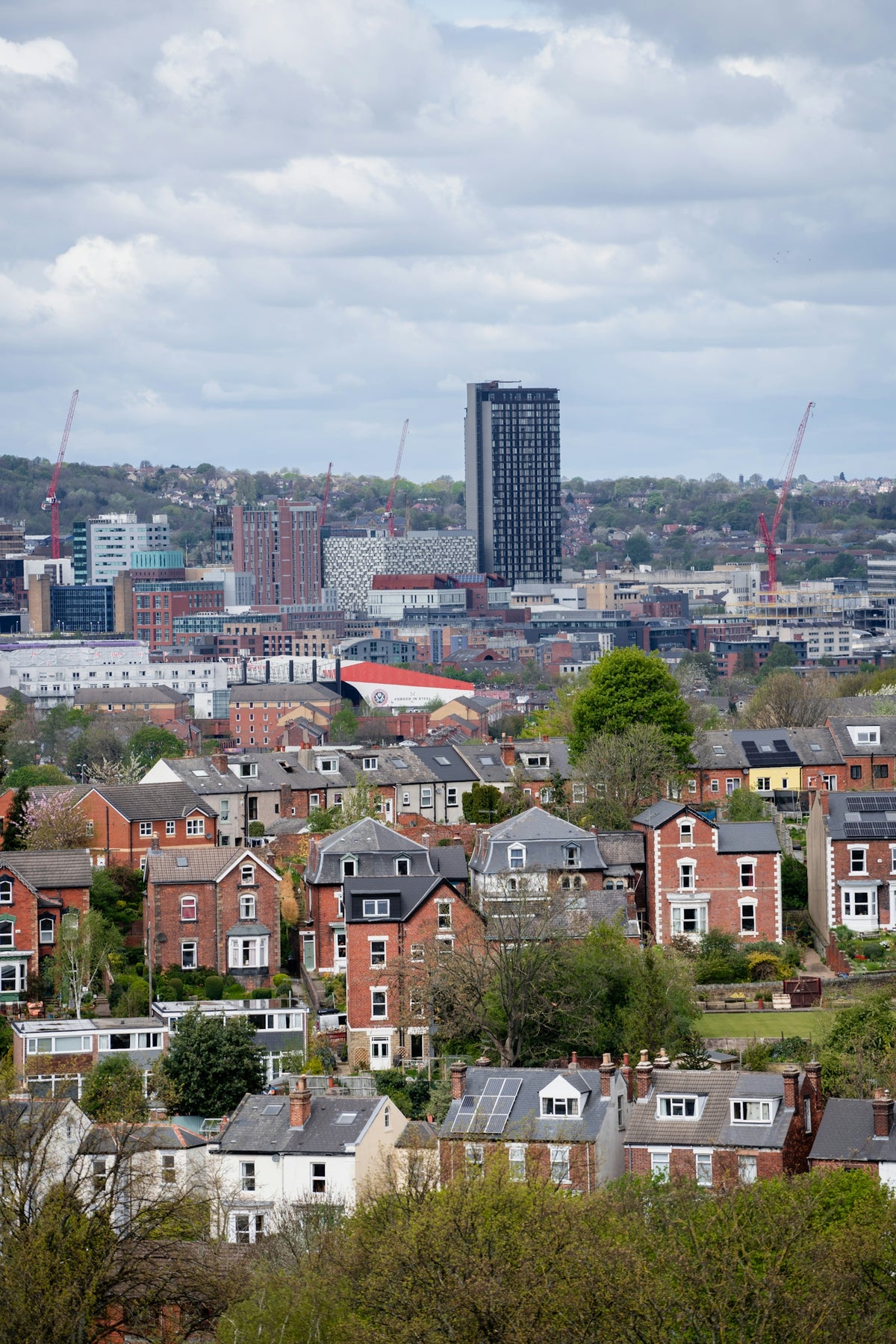 a view of a city from a hill